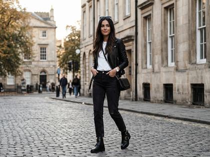モノトーンコーデとレザーアイテムを取り入れたかっこいい女性のファッション全身写真