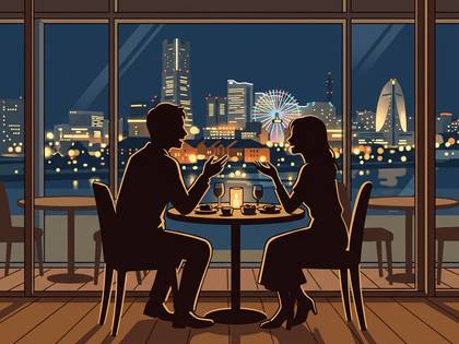 窓から夜景が見えるレストランで語り合う男女。