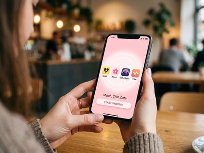 スマホ画面にマッチングアプリのアイコンが並んでいるイメージ、ピンク系の柔らかい配色